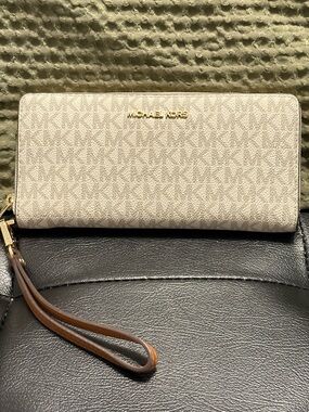 Michael Kors Cream Signature Zip Wristlet Wallet with Brown Strap